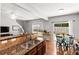Spacious kitchen featuring granite countertops, stainless steel appliances, and hardwood floors at 720 Mountain Laurel Dr, Canton, GA 30114