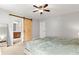 Primary bedroom features a sliding barn door to the bathroom, carpeted floors, and neutral walls at 720 Mountain Laurel Dr, Canton, GA 30114