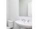 Modern half-bathroom featuring a floating vanity with a vessel sink and toilet at 116 Chattahoochee Cir, Locust Grove, GA 30248