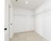 Spacious walk-in closet with built-in wire shelving for efficient storage solutions at 116 Chattahoochee Cir, Locust Grove, GA 30248