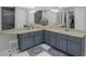 Bathroom with a vanity area, stylish cabinets, and ample counter space at 3067 Nuptial Ln, Lawrenceville, GA 30044