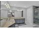 Bright bathroom with double sinks, updated cabinets, and a modern shower at 3067 Nuptial Ln, Lawrenceville, GA 30044