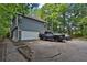 Exterior view of the home, driveway and attached two car garage at 3067 Nuptial Ln, Lawrenceville, GA 30044