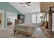 Spacious main bedroom with a large bed, side tables, and plenty of natural light at 3067 Nuptial Ln, Lawrenceville, GA 30044