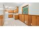 Traditional eat-in kitchen with wood cabinets, white appliances, and tile flooring at 4074 Idlevale Dr, Tucker, GA 30084