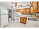 Well-maintained kitchen with classic wood cabinetry, bright lighting, and tile flooring for easy maintenance at 4074 Idlevale Dr, Tucker, GA 30084