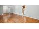 Hardwood floors throughout the living room leading to the hallway and kitchen with fresh paint at 4074 Idlevale Dr, Tucker, GA 30084