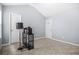 Spare bedroom with neutral paint, vaulted ceilings and carpeting at 6297 Polar Fox Ct, Riverdale, GA 30296