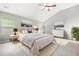 Spacious bedroom with vaulted ceilings, neutral paint, and natural light at 6297 Polar Fox Ct, Riverdale, GA 30296