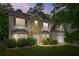Charming home with well-manicured front yard, brick accents, and attached garage at 6297 Polar Fox Ct, Riverdale, GA 30296