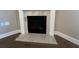 Modern fireplace featuring a marble hearth and white trim in a neutral-toned room at 1001 Calypso Way # 1001, Cumming, GA 30040