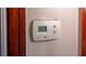 Image shows a close up of a thermostat with manual system controls on a wall at 1025 Cheaves St, Forest Park, GA 30297