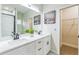 Double sink bathroom with large mirror and walk in closet at 2621 Oldknow Nw Dr, Atlanta, GA 30318
