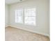 Bedroom featuring neutral walls, carpet, and natural light at 2621 Oldknow Nw Dr, Atlanta, GA 30318