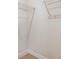 Walk-in closet featuring beige carpet and metal shelving at 2621 Oldknow Nw Dr, Atlanta, GA 30318