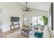 Open living area featuring vaulted ceilings, modern decor, and a comfortable seating arrangement at 2621 Oldknow Nw Dr, Atlanta, GA 30318