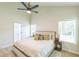 Vaulted main bedroom featuring neutral walls and natural light at 2621 Oldknow Nw Dr, Atlanta, GA 30318