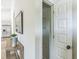 Open pantry with wire shelving and a view of the kitchen and stainless steel appliances at 2621 Oldknow Nw Dr, Atlanta, GA 30318