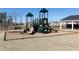 Community playground at the Stanley Martin River Oaks neighborhood featuring two slides at 509 Altamaha Ct, Locust Grove, GA 30248