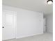 Bedroom featuring plush carpet and neutral walls, offering a serene and comfortable atmosphere at 736 Ocmulgee Xing, Locust Grove, GA 30248