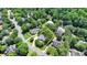 An aerial view shows the property and the surrounding homes at 1830 Hadfield Blvd, Roswell, GA 30075