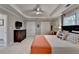 Bedroom with a queen bed, a ceiling fan, and double closets at 1830 Hadfield Blvd, Roswell, GA 30075