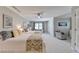 Spacious bedroom featuring two beds, a sitting area, and ample closet space at 1830 Hadfield Blvd, Roswell, GA 30075