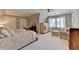 Cozy bedroom featuring twin beds, a seating area by the window, and ample closet space at 1830 Hadfield Blvd, Roswell, GA 30075
