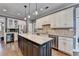 Kitchen with center island, stainless steel appliances, granite countertops, and plenty of cabinets at 1830 Hadfield Blvd, Roswell, GA 30075