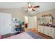 Bedroom featuring a desk, vanity, and access to bathroom at 245 Tapestry Dr, Mcdonough, GA 30252