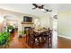 Stylish dining room with hardwood floors, open to the living areas, ideal for entertaining and modern living at 245 Tapestry Dr, Mcdonough, GA 30252