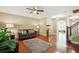 Inviting living room with hardwood floors and comfortable seating area offers a relaxing atmosphere at 245 Tapestry Dr, Mcdonough, GA 30252