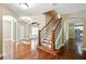 Staircase is located in the main entryway and boasts hardwood floors and iron spindles at 245 Tapestry Dr, Mcdonough, GA 30252