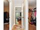 View of the main bedroom with walk-in closets featuring custom shelving and plenty of storage at 245 Tapestry Dr, Mcdonough, GA 30252