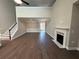 Spacious living room showcases high ceilings and a fireplace for a cozy and inviting atmosphere at 2503 Wollerton St # 2503, Cumming, GA 30040