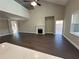 Bright and airy living room with a high ceiling, fireplace, and an open layout at 2503 Wollerton St # 2503, Cumming, GA 30040