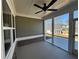 Enjoyable screened porch space with ceiling fan and view of the backyard at 2503 Wollerton St # 2503, Cumming, GA 30040