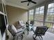 Cozy screened porch with comfortable seating and wooded views at 2503 Wollerton St # 2503, Cumming, GA 30040
