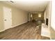 Spacious basement with light gray flooring and a white brick fireplace at 2751 Colonial Dr, College Park, GA 30337