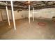 Unfinished basement with exposed ceiling and support beams at 2751 Colonial Dr, College Park, GA 30337