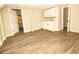 Basement area featuring a sink, cabinets, neutral flooring and two doors at 2751 Colonial Dr, College Park, GA 30337
