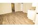 Basement area featuring a sink, cabinets, neutral flooring and neutral paint at 2751 Colonial Dr, College Park, GA 30337