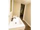 Bathroom with neutral paint, vinyl flooring and an updated sink at 2751 Colonial Dr, College Park, GA 30337