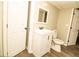 Bathroom featuring neutral paint and wood-look flooring at 2751 Colonial Dr, College Park, GA 30337