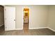 Bedroom featuring wood-look flooring and bathroom doorway at 2751 Colonial Dr, College Park, GA 30337