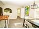 Dining room featuring modern flooring, neutral paint, modern lighting and backyard views at 2751 Colonial Dr, College Park, GA 30337