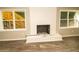 Basement brick fireplace and plank flooring at 2751 Colonial Dr, College Park, GA 30337