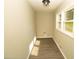 Utility room featuring modern flooring, neutral paint, lots of natural light, and utility connections at 2751 Colonial Dr, College Park, GA 30337