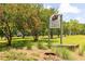 Community sign for Dauset Trails Nature Center surrounded by trees and natural landscaping at 516 Altamaha Ct, Locust Grove, GA 30248