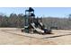 Community playground with slides and climbing structures for recreational activities at 516 Altamaha Ct, Locust Grove, GA 30248